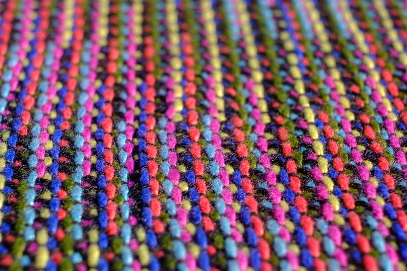 Close-up of a handwoven shawl showing part of the diamond pattern