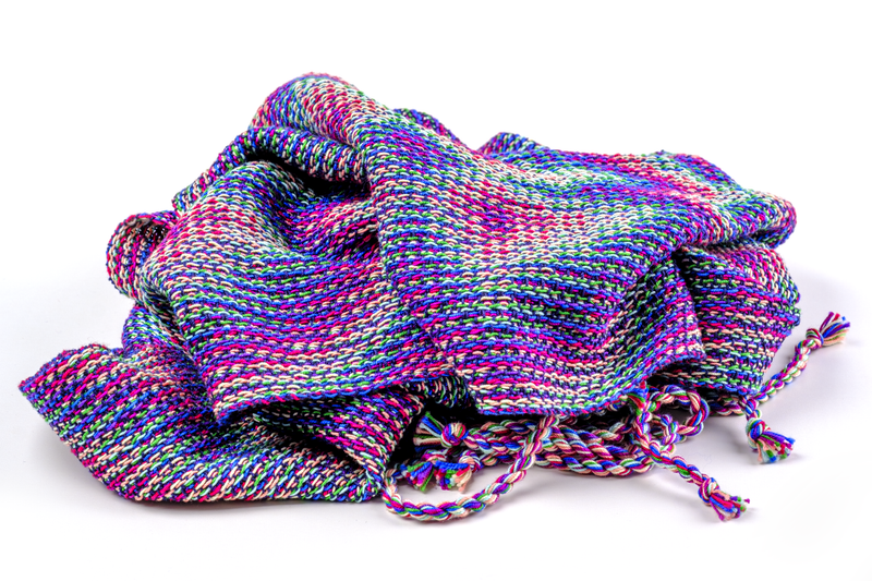 Handwoven shawl in crochet cotton wrapped in a bunch