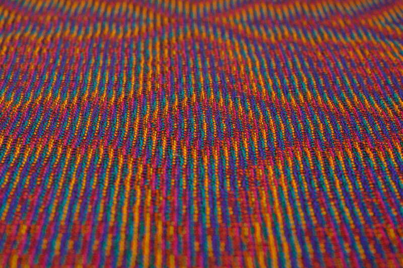 A close-up of the star pattern woven in echo-8 using fine cotton yarn at an angle