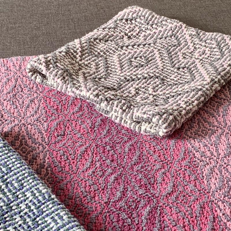 Close-up of samples of crochet cotton woven items