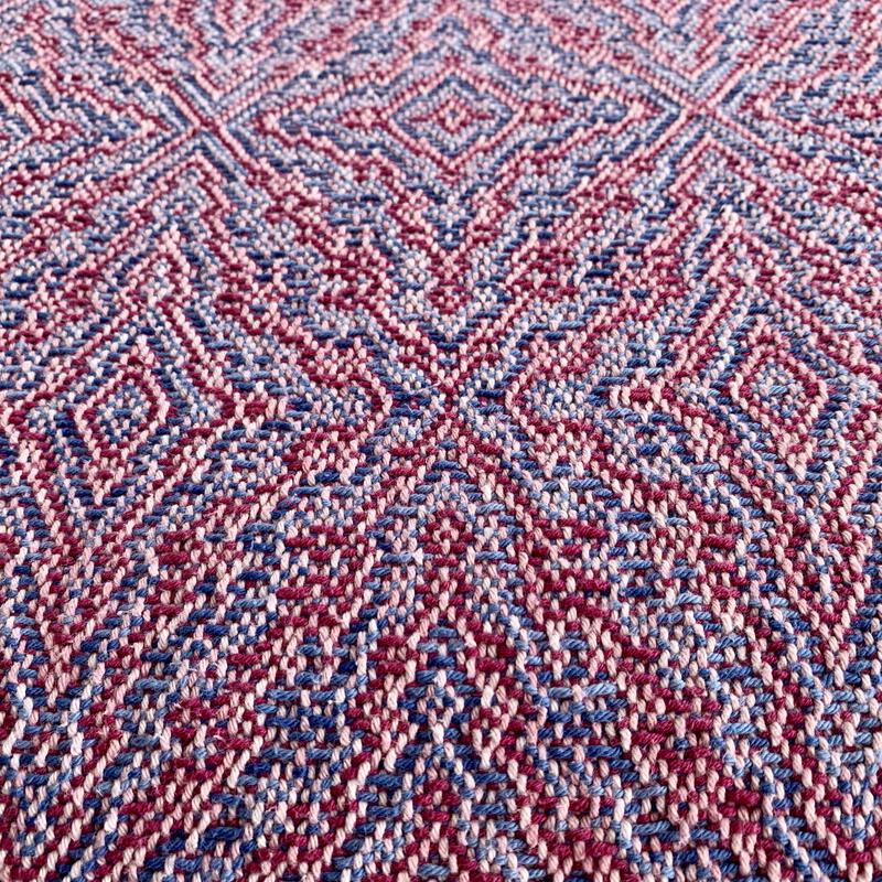 Woven towel with blue and pink weft
