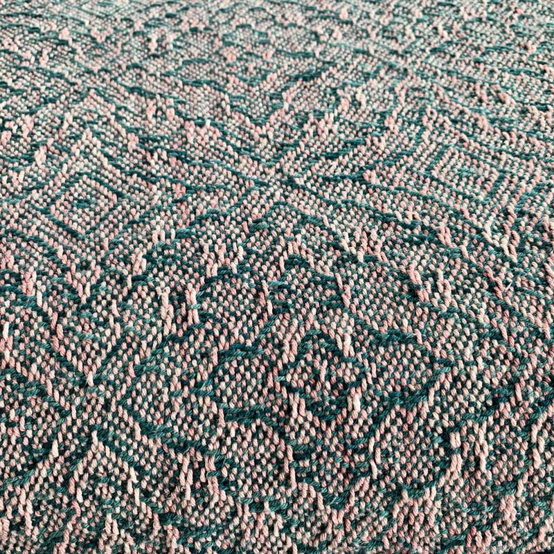 Woven towel with turquoise weft