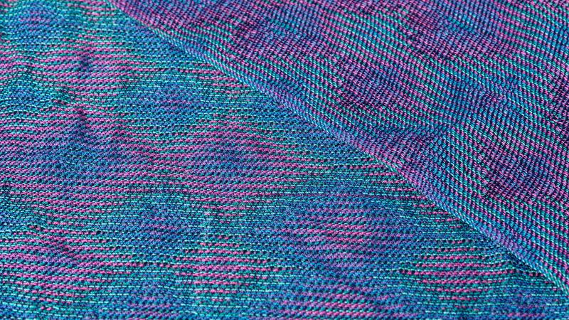 Both sides of a shawl with a star pattern, woven using the echo-8 technique.