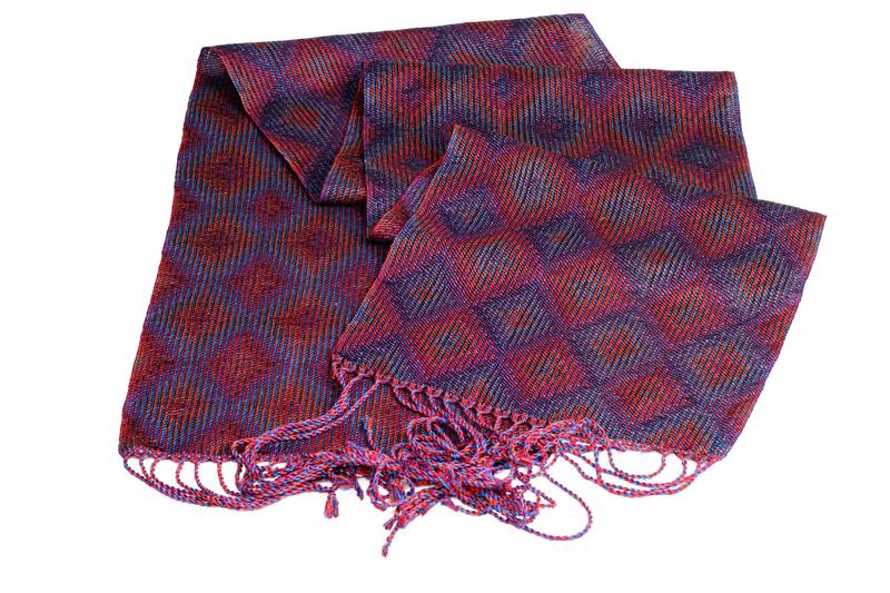 Overview of shawl woven on 12 shafts using the echo-8 technique with an advancing diamond pattern.