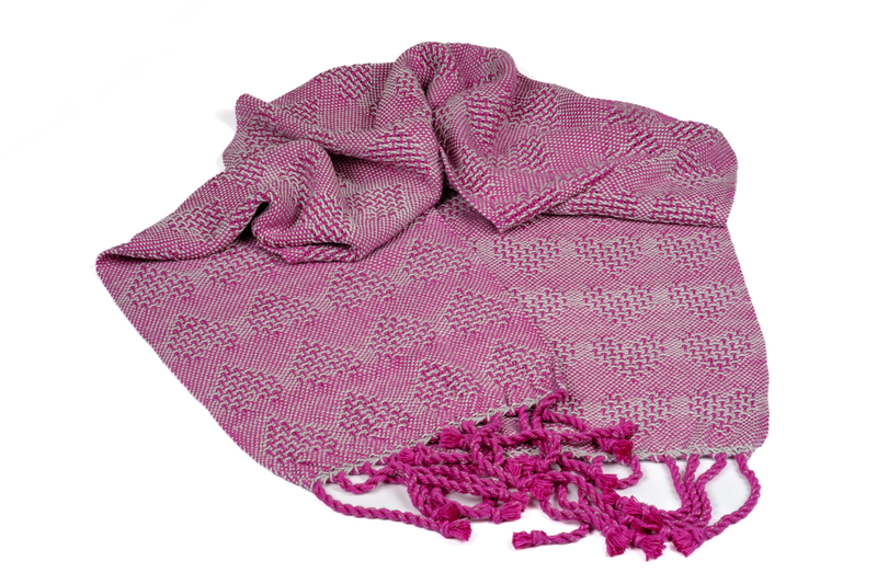 Handwoven shawl in echo-8 technique using crochet cotton yarn, thrown in a bunch