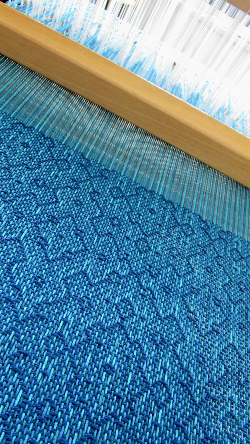 Shawl on the loom at a diagonal angle