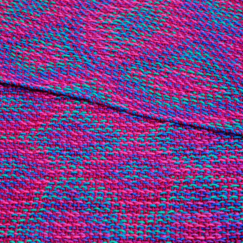 Close-up of handwoven shawl in echo weave folded onto itself