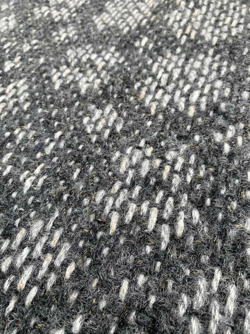 Close-up of light clovers on a dark background